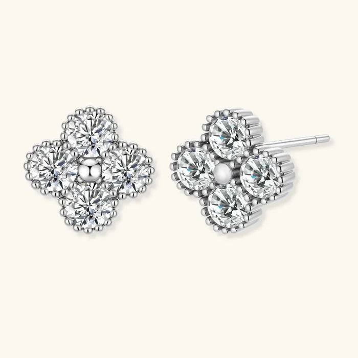 Quatrefoil Moissanite Stud Earrings in polished silver, with four round stones, clover silhouettes and beaded borders