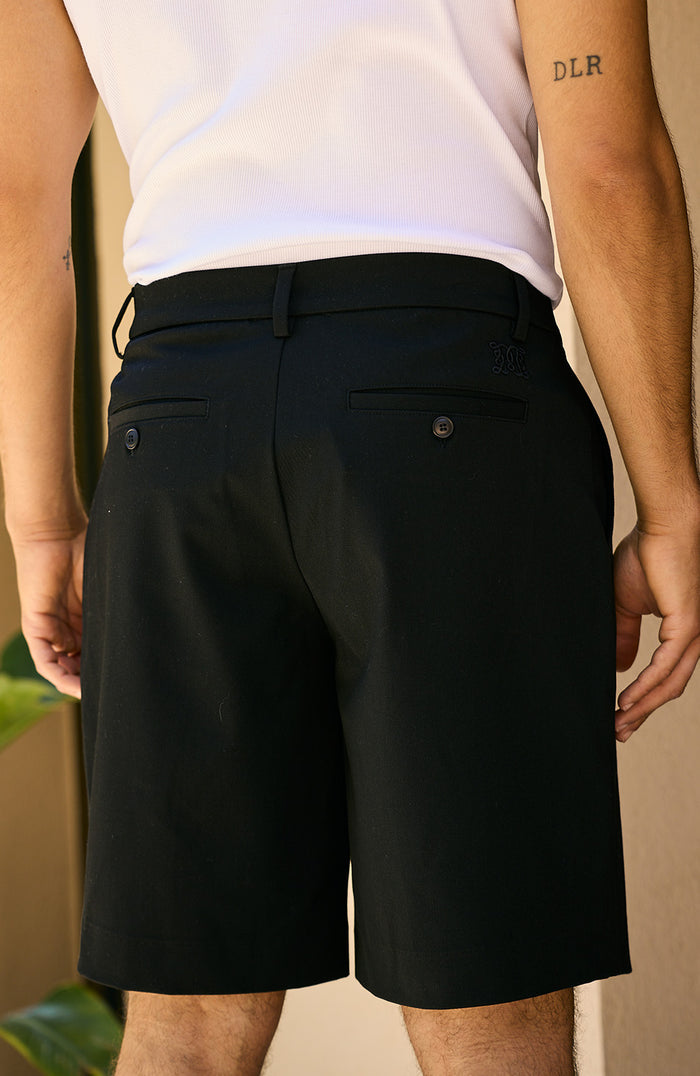 Relaxed Pleated Bermuda Shorts in Black