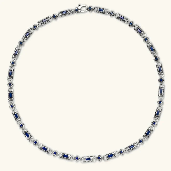 Blue link necklace with Baguette-cut and round stones set in ornate antique silver-tone scrollwork links