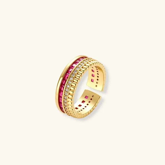 Royal Ruby Red Zirconia open-band ring with gold-tone ridged edges, deep red stones and clear pavé accents