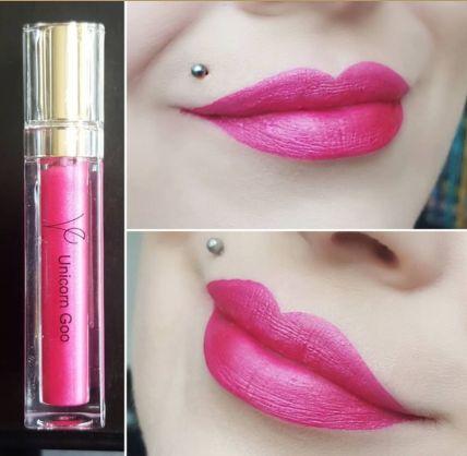 bright metallic electric vivid pink lipstick swatched on lips