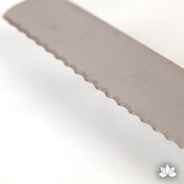 Serrated Knife 14" stainless steel used for cutting layers in your larger cakes when cake decorating.  A cake decorator's must have in the bakery or kitchen.
