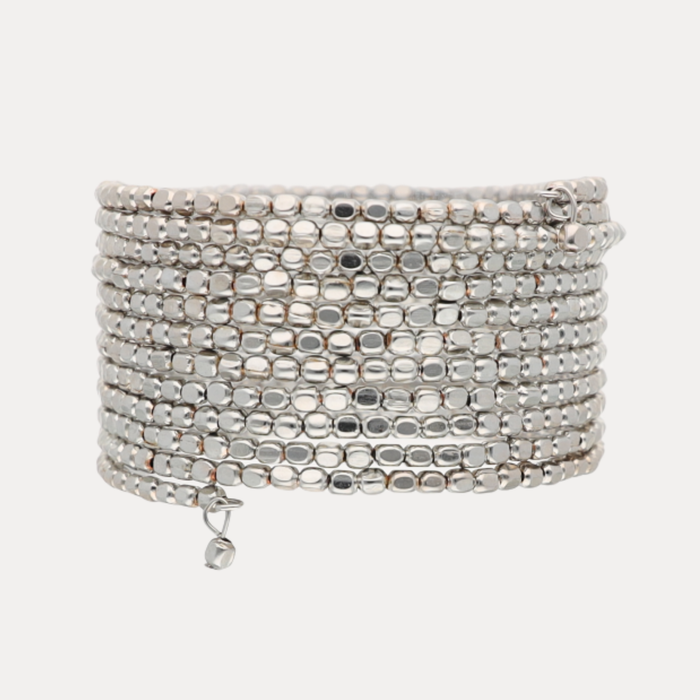 a silver bracelet with a white background