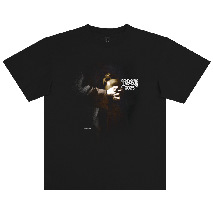 This classic fit St. Francis Tee by Other showcases a striking graphic of a hand holding a golden object, highlighted by white stylized “ROSE 2025” text above the image. Centered on the front with a subtle shadowy effect around the design, this black t-shirt is made from heavy-weight cotton for enduring comfort and durability.
