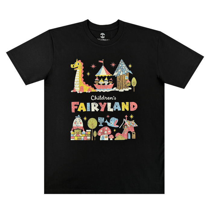 The Oaklandish Starlit Tee is a black shirt with playful, hand-drawn artwork of giraffes, tents, castles, trees, and animals plus "Children’s FAIRYLAND," celebrating Oakland’s iconic storybook park.