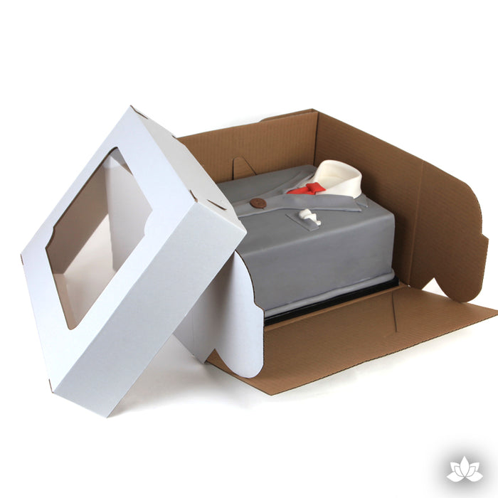 Transport your finished cakes safely with this Window Cake Box. The window allows you to see your beautiful cake creations. White Cake Box