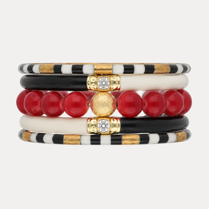 a stack of colorful bracelets