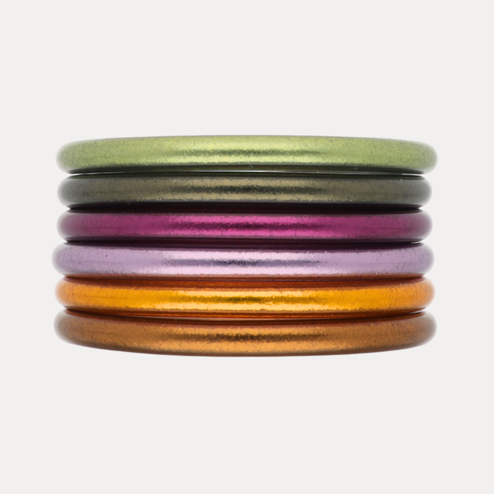 a stack of colorful bracelets