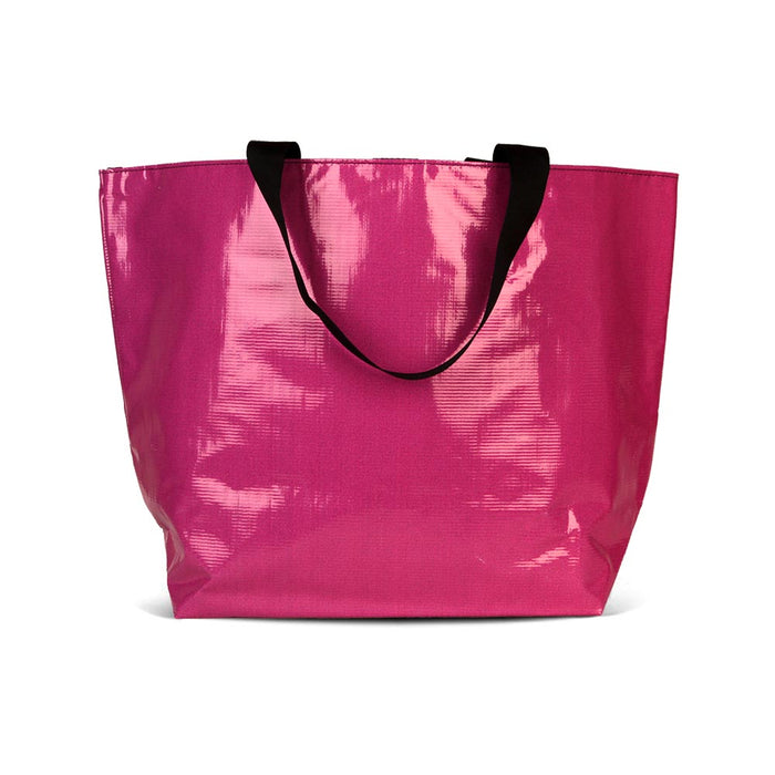 The Essential Tote for carrying your personal and cake items around with you. Made with recycled billboard material.