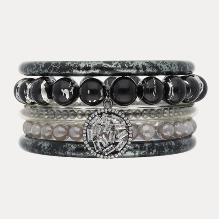 a stack of bracelets with beads