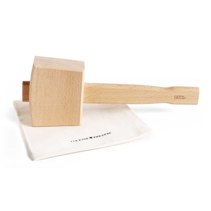 Wooden ice mallet with bag on white background