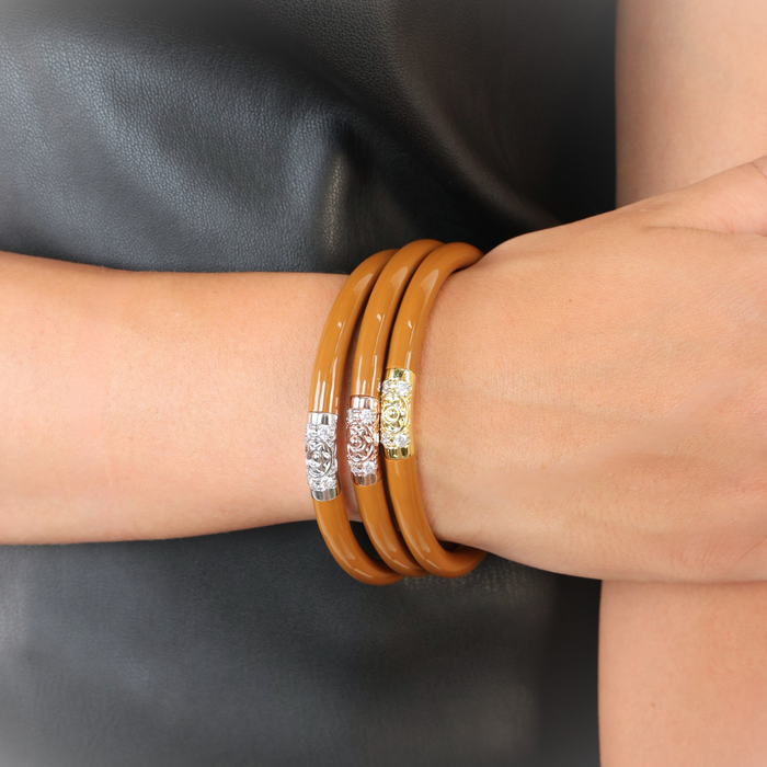 a close up of a bracelet on a wrist