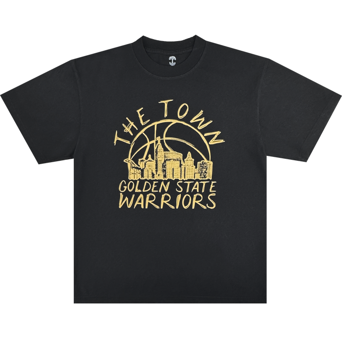The Town Doodle Tee by Other showcases a bold yellow city skyline graphic with a basketball backdrop on a black shirt. Above the skyline, “THE TOWN” is written, while “GOLDEN STATE WARRIORS” appears below—both in bold, hand-drawn style lettering. Part of the exclusive Warriors x Oaklandish Town Collection, this tee celebrates Golden State Warriors pride and Oakland’s vibrant spirit.