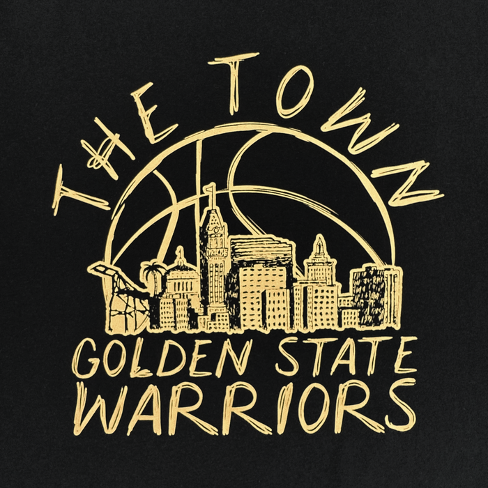 The Town Doodle Tee by Other features a stylized gold design on black, with “THE TOWN” above a basketball, the Oakland city skyline, and a bridge. Below, “GOLDEN STATE WARRIORS” is printed. Part of the Warriors x Oaklandish Town Collection, this tee blends basketball elements with urban architecture.