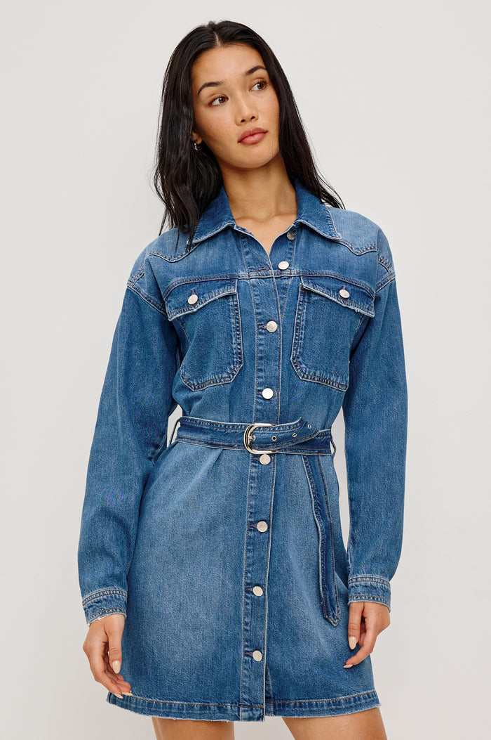 Tustin Mini Shirt Dress in Rigid Denim With Western Yoke, Front Buttons, Self Belt, Dropped Shoulders, and Long Sleeves in Skyride Colorway - Upper Body Front View Featured on Model