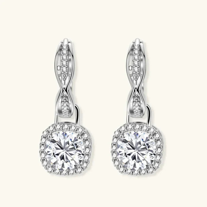 Twisted Infinity Halo Moissanite Earrings in silver-toned metal, with twisted pavé huggie tops and round stones in cushion halos