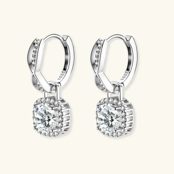 Twisted Infinity Halo Moissanite Earrings in silver-tone metal with crystal-set huggie tops and round stones in cushion-shaped halos