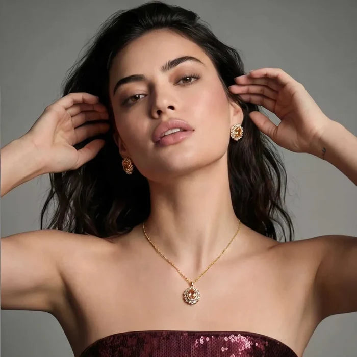 Vintage Glamour necklace and stud earring set in gold-tone metal with peach oval stones and sparkling clear accents