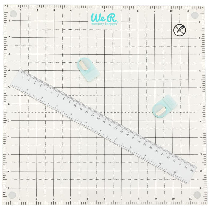 We R Memory Keepers - All-In-One Magnetic Platform. The All-In-One Magnetic Platform is perfect for stenciling, aligning, embossing, and cutting. One side is an easy-clean work surface. Available at Embellish Away located in Bowmanville Ontario Canada.