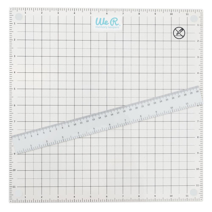 We R Memory Keepers - All-In-One Magnetic Platform. The All-In-One Magnetic Platform is perfect for stenciling, aligning, embossing, and cutting. One side is an easy-clean work surface. Available at Embellish Away located in Bowmanville Ontario Canada.
