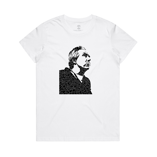 The Women's Coach Beam's Legacy Tee by Oaklandish features a black and white graphic of a face in profile, with abstract, labyrinth-like patterns inspired by Oakland youth for a bold visual impact.