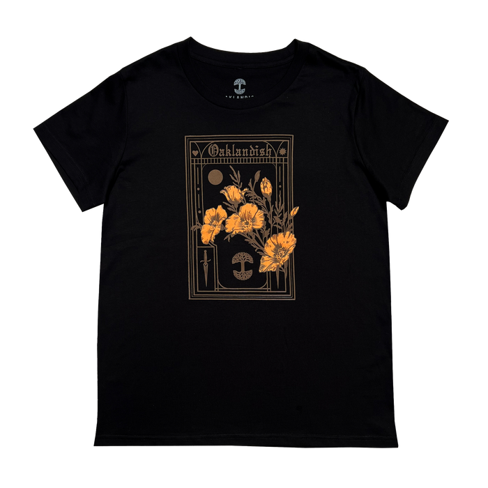 The Women's Blossom Tee by Oaklandish is a black t-shirt featuring a graphic design of California's state flower, orange poppies, centered on the front. The design is embellished with gothic-style borders and symbols surrounding the flowers, with "Oshkosh" elegantly written at the top. Available in women's sizes.