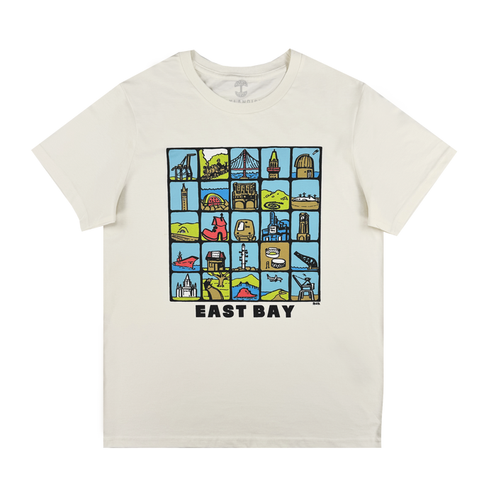 The Oaklandish Women's East Bay Landmarks Tee is a white shirt with a vibrant grid of cartoon-style East Bay icons and landmarks, finished with bold "EAST BAY" text below the design.