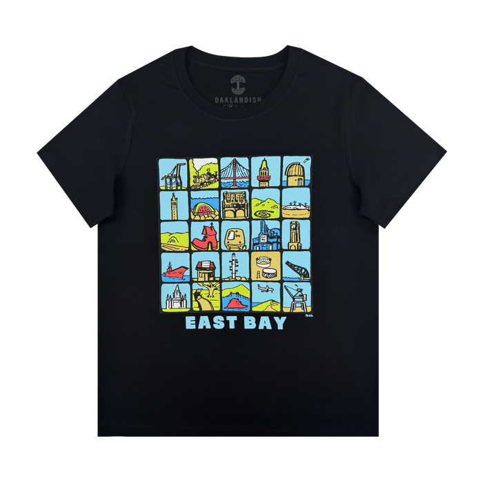 The Oaklandish Women's East Bay Landmarks Tee is a black shirt with colorful cartoon-style icons of bridges, buildings, and hills in a 5x4 grid above bold blue and white “EAST BAY” text.