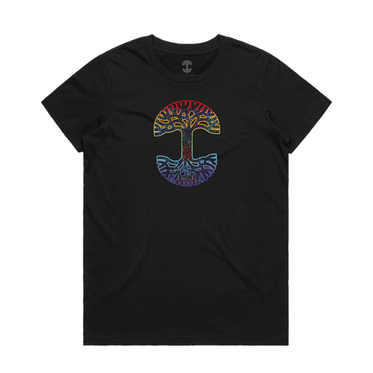 The Women's Prism Tee by Oaklandish is a black, 100% cotton T-shirt featuring a colorful symmetrical tree design with bright rainbow roots and branches. It has a classic fit and is showcased flat on a white background.