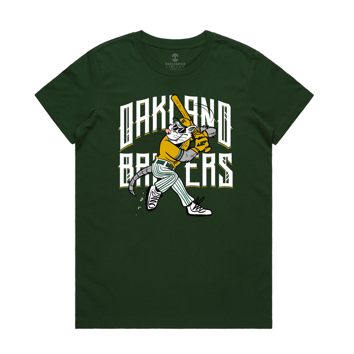 The Women’s Slugging Scrappy Tee by Other is a green t-shirt adorned with a cartoon cat dressed in a yellow baseball uniform swinging a bat, set against bold white “Oakland Batsers” lettering in a stylized font—an ideal pick for Oakland baseball fans or anyone who enjoys fun tributes to local icons like Scrappy the Rally Possum.