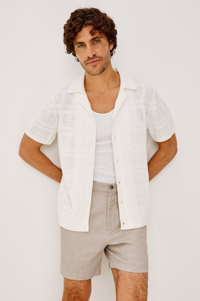 Yates Camp Shirt in Jacquard Knit With Open Collar, Short Sleeves, Front Buttons, and Relaxed Fit in White Colorway - Upper Body Front View Featured on Model