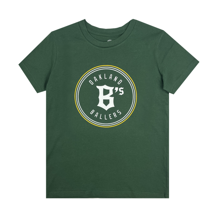 The Youth Oakland Ballers Logo Tee is a green T-shirt featuring the Oakland Ballers' logo with "OAKLAND" arched above and "BALLERS" below a prominent "B's" in the center. The logo, representing the new professional baseball team in the Pioneer League, is encircled by white and yellow lines on a plain background. Made by Oakland Ballers, this tee celebrates their spirited team identity.