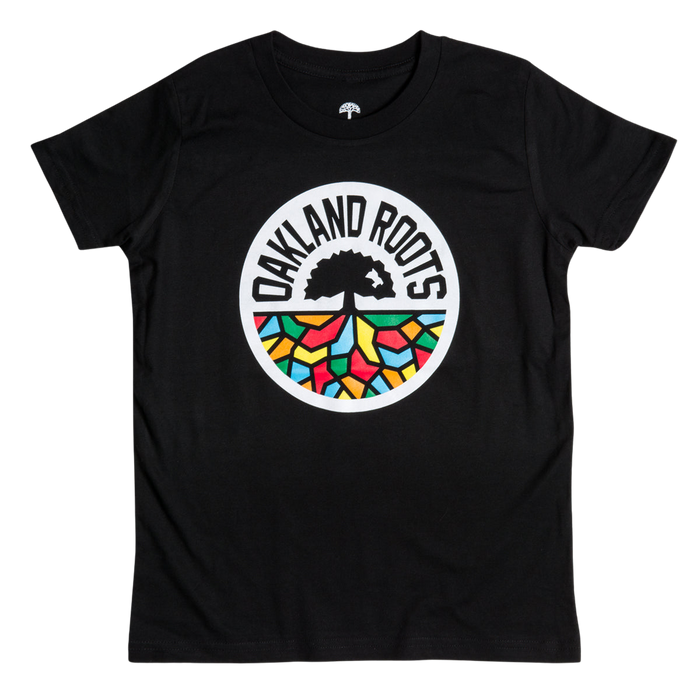 Youth Oakland Roots SC Classic Tee in black, featuring a central circular logo with the words "OAKLAND ROOTS." The logo, inspired by Oaklandish artistry, showcases an abstract tree with roots extending into a vibrant mosaic pattern in red, yellow, blue, and green. Ideal for fans of Oakland Roots Sports Club.
