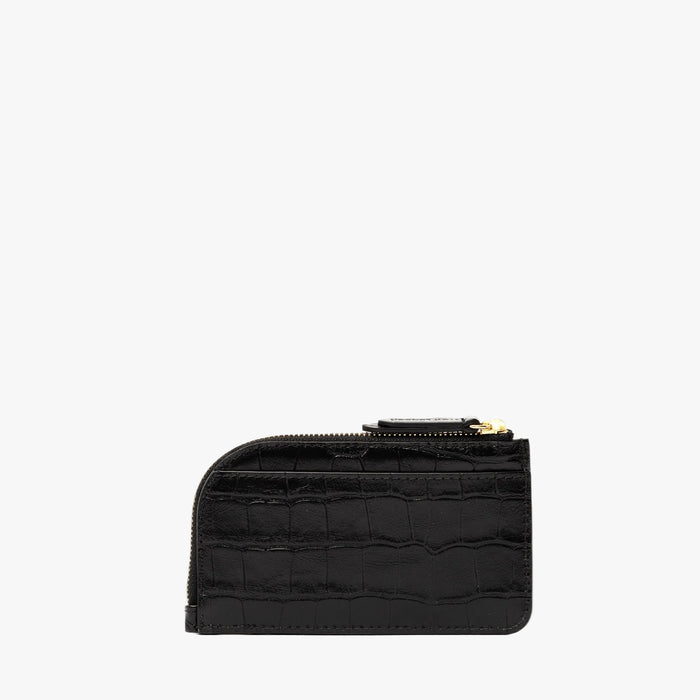Back panel of STOW London's Zip Wallet in Black Embossed Croc leather on a light grey background featuring a YKK Natulon zipper and the rear slip pocket